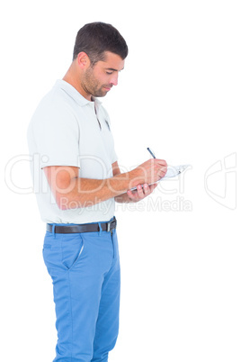 Supervisor writing on clipboard over white background