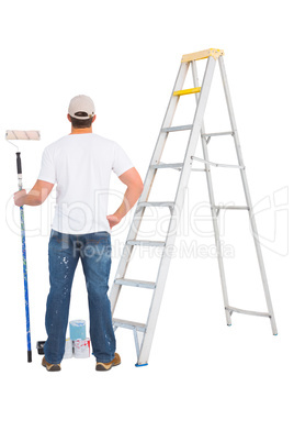 handyman with paint roller and ladder