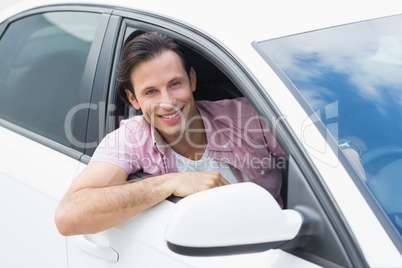 Man driving and smiling