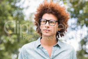 Young man thinking in the park