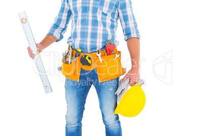 Manual worker holding spirit level