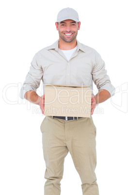 Portrait of happy delivery man with cardboard box