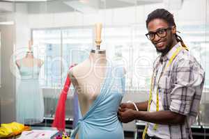 Male fashion designer and mannequin