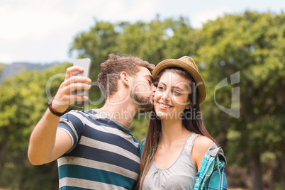 Young couple taking a selfie