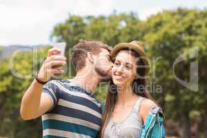 Young couple taking a selfie