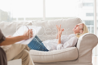 Depressed woman speaking to therapist