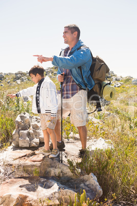 Father and son hiking in the mountains