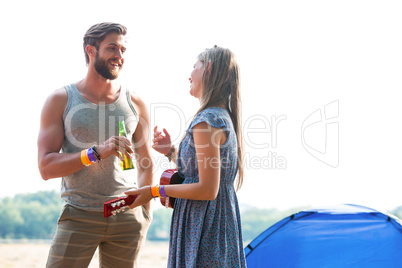 Two friends chatting in campsite