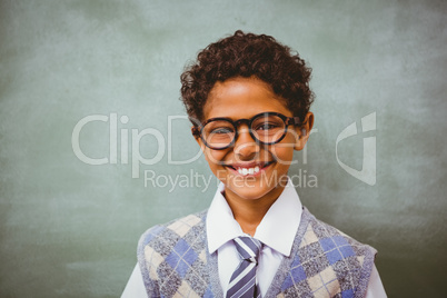 Cute little boy smiling in classroom