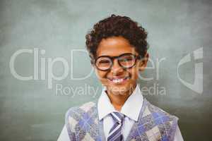 Cute little boy smiling in classroom