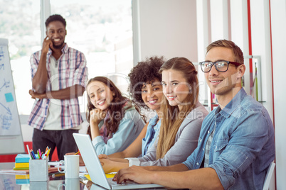 Fashion students smiling at camera