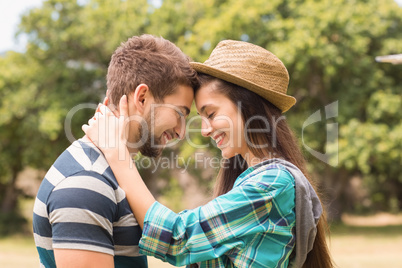 Young couple hugging in the park