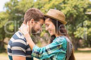 Young couple hugging in the park