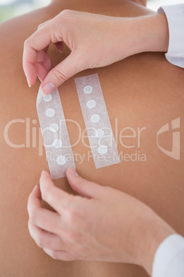 Doctor doing skin test to her patient