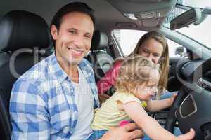 Parents and baby on a drive