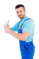 Repairman holding spanners