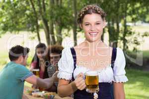 Pretty oktoberfest girl smiling at camera
