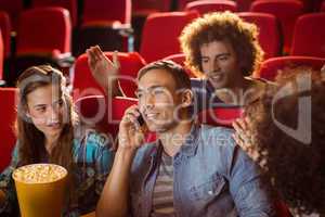 Annoying man on the phone during movie
