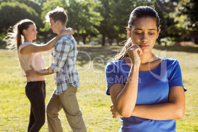 Man being unfaithful in the park