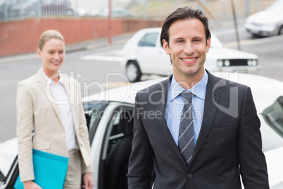 Team of businessman smiling at camera
