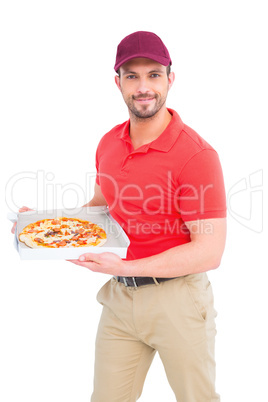 Delivery man showing fresh pizza