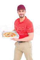 Delivery man showing fresh pizza