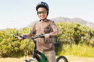 Little boy on a bike ride