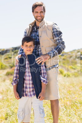 Father and son hiking in the mountains