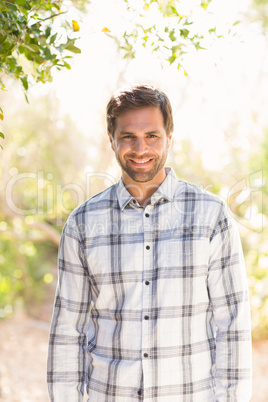 Happy man smiling at camera