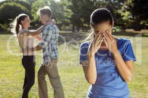 Man being unfaithful in the park