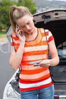 Young woman calling with her mobile phone