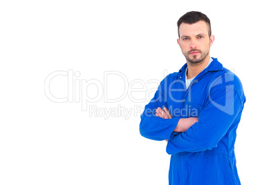 Mechanic standing arms crossed Mechanic standing arms crossed