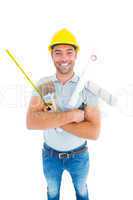 Portrait of happy manual worker holding various tools