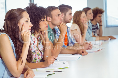Fashion students being attentive in class