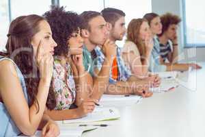 Fashion students being attentive in class