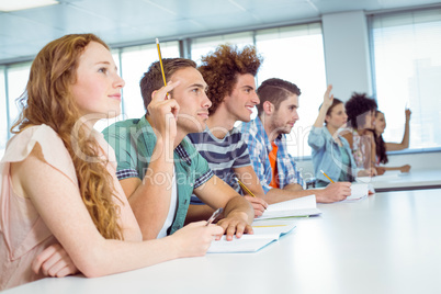 Fashion students being attentive in class