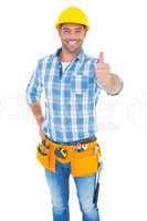 Portrait of confident manual worker gesturing thumbs up