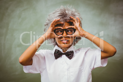Little boy dressed as senior teacher