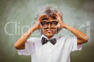 Little boy dressed as senior teacher