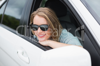 Happy woman in the drivers seat