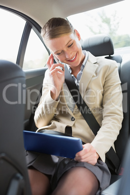 Businesswoman working on her tablet computer