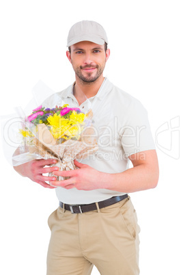 Delivery man holding bouquet