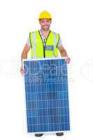 Smiling handyman with solar panel