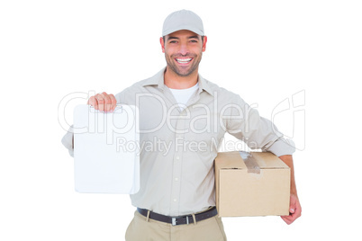 Delivery man with cardboard box showing clipboard