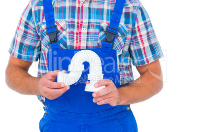 Plumber holding sink pipe on white background