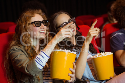 Young friends watching a 3d film