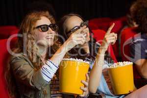 Young friends watching a 3d film