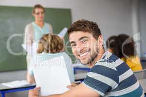 Portrait of happy male student