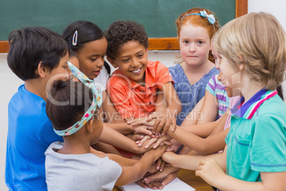 Cute pupils smiling in classroom