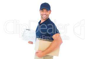 smiling delivery man with cardboard box and clipboard